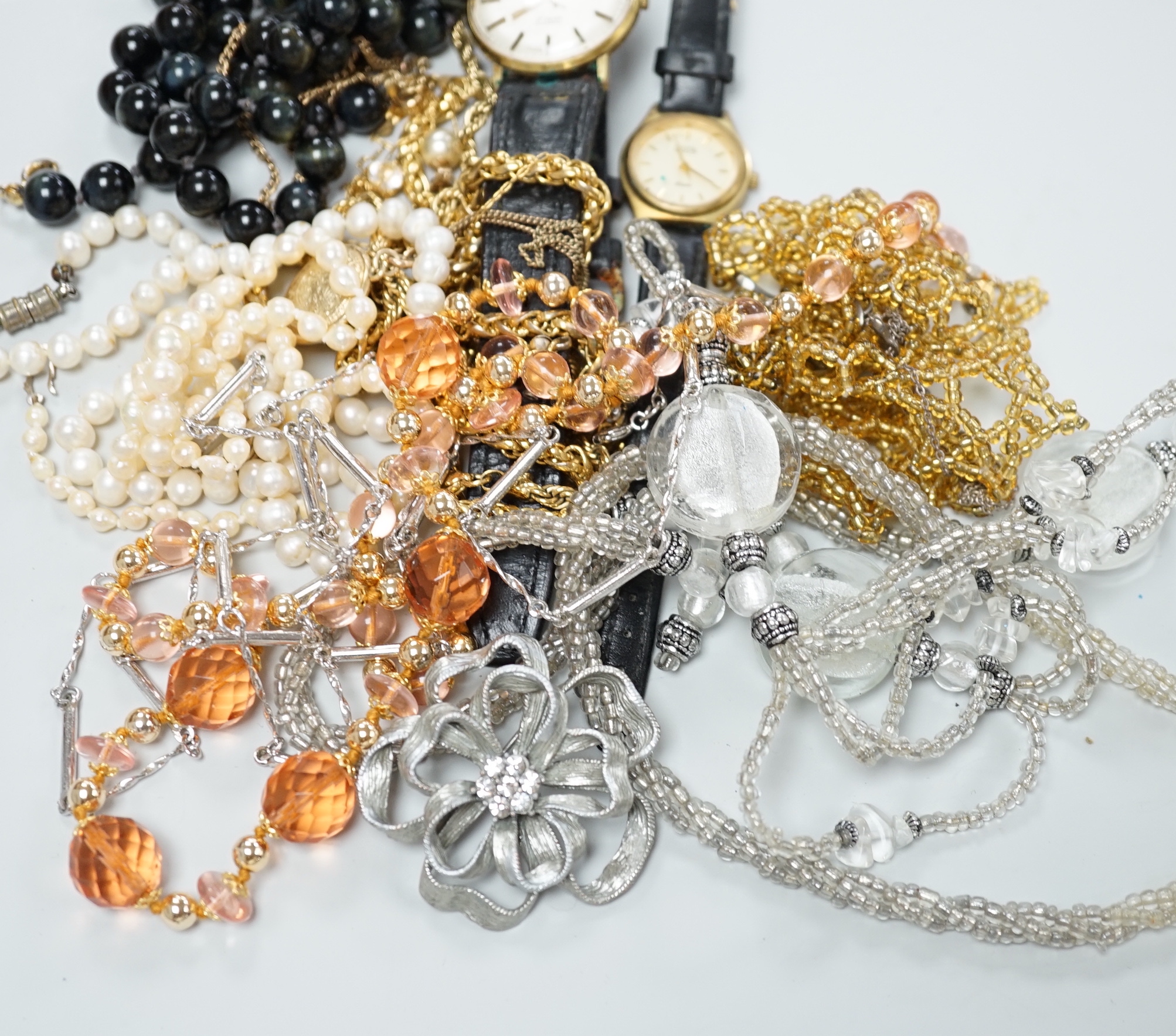A quantity of assorted costume jewellery and wrist watches including a gentleman's steel and gold plated Rotary.